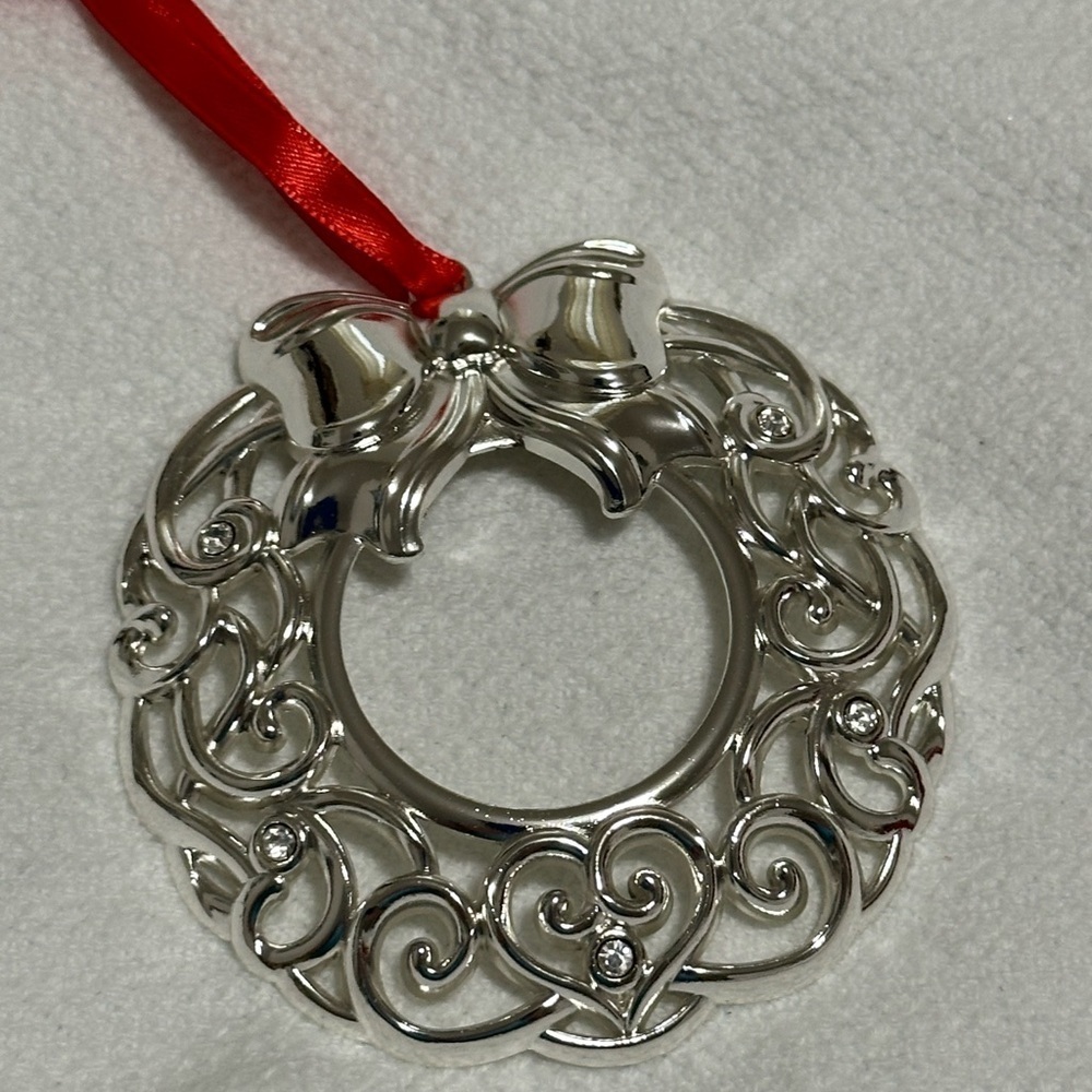 Lenox silver plated wreath ornament with red ribbon. New!